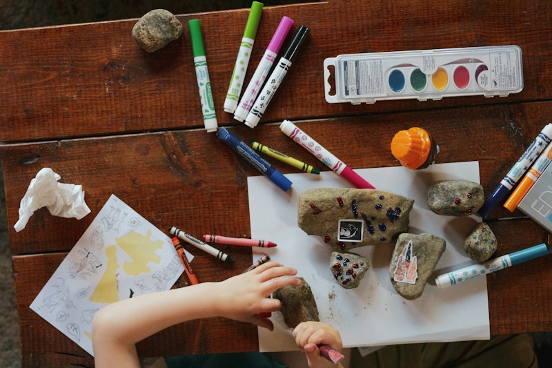 Kids painting and playing with Bobba Kazoo